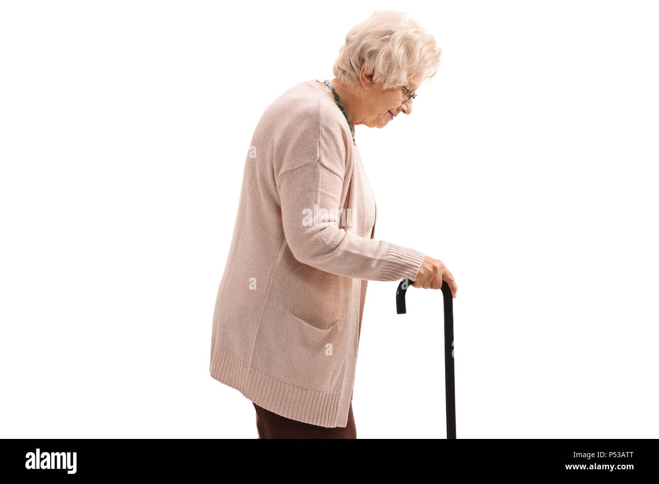Elderly woman with a cane isolated on white background Stock Photo