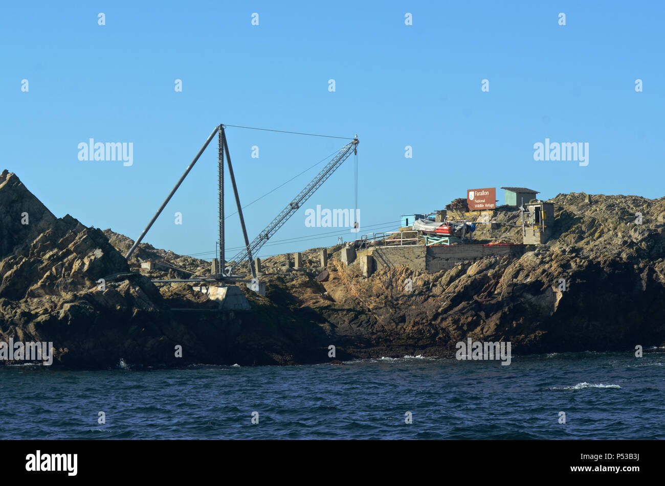 The crane and boat platform on the Southeast Farallon Island, allowing researchers to get on and off the island, and receive supplies. Stock Photo