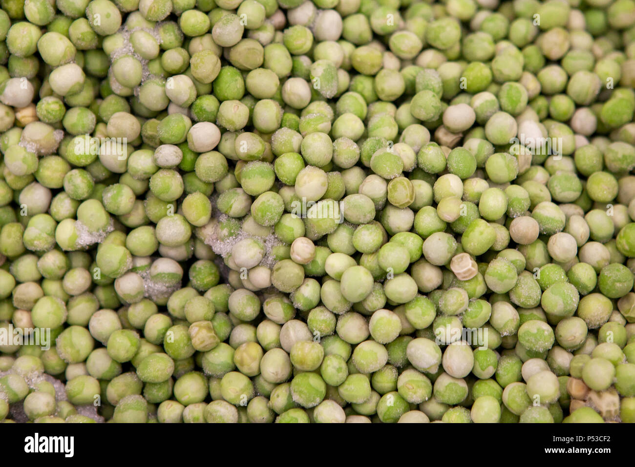 Semifinished products. Frozen food. Green pea Stock Photo Alamy