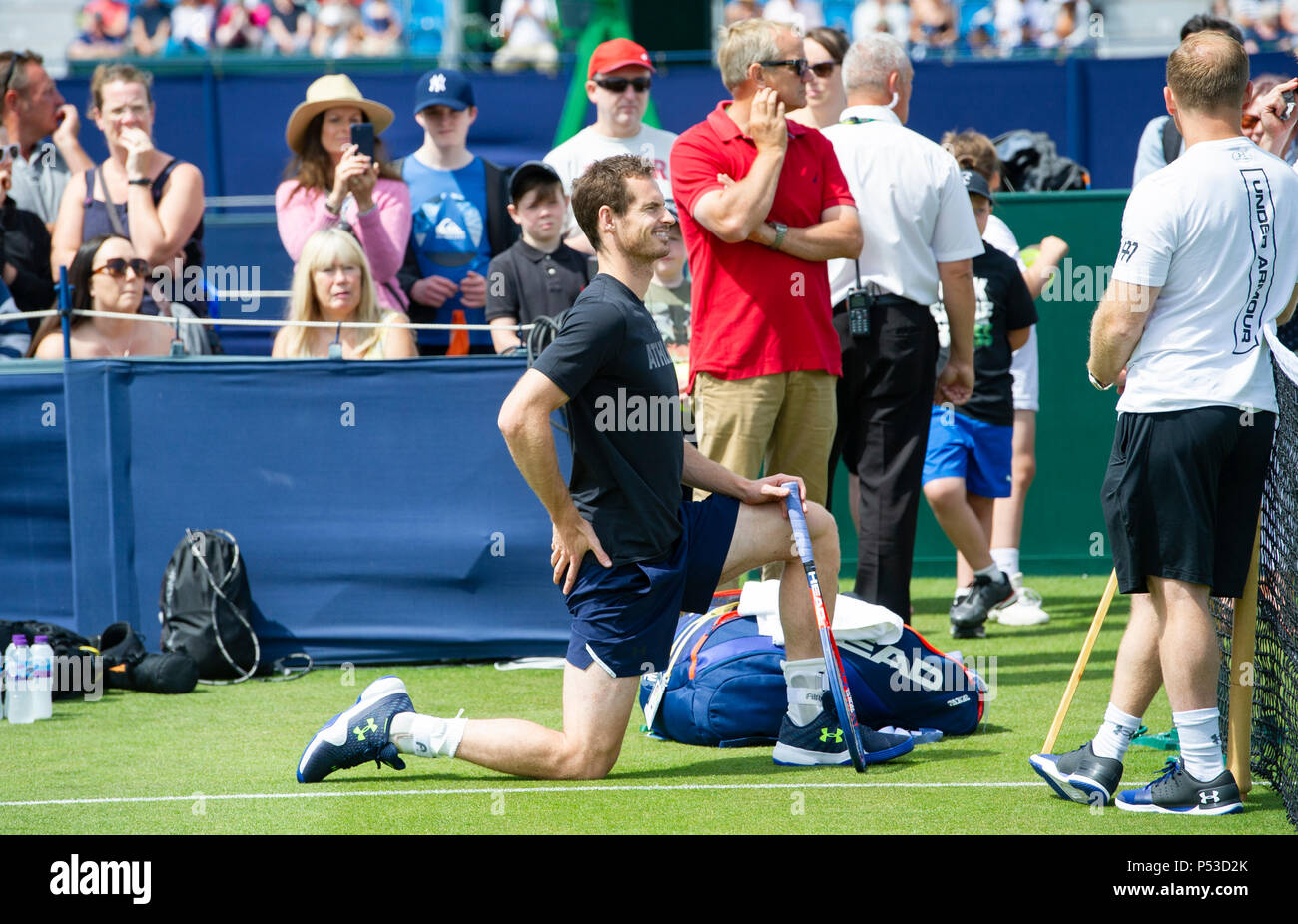 Andy Murray stretches on the practice courts during the Nature Valley International tennis tournament at Devonshire Park in Eastbourne East Sussex UK. 24 June 2018 Stock Photo