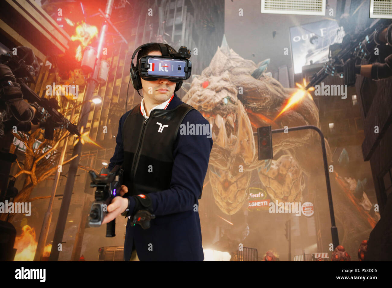 Barcelona,   Spain - Man is trying out a virtual reality computer game at the Mobile World Congress MWC in Barcelona Stock Photo