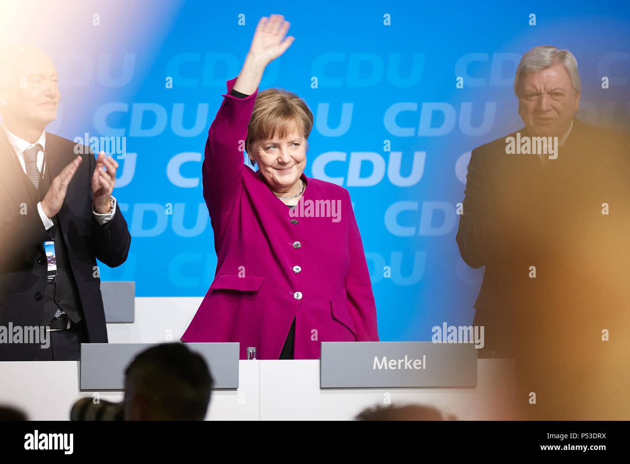 Berlin, Germany - The party leader Angela Merkel at the 30th Federal Party Congress of the CDU standing on the podium with a gesture of thanks. Stock Photo