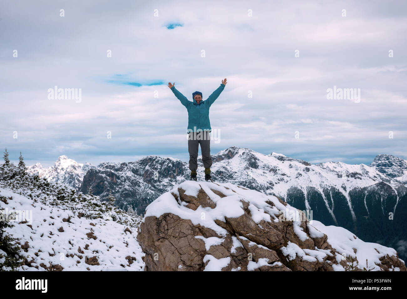 Woman standing on top mountain hi-res stock photography and images - Alamy