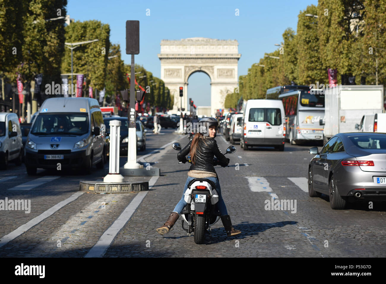 October 9, 2015 - Paris, France: Emma Fleurose drives a Cityscoot, an  electric scooter that will soon be available as part of a self-service  rental scheme in Paris. Cityscoot is the latest