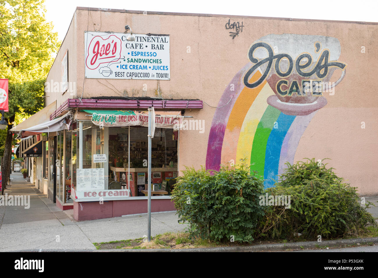 Coffee restaurant business with a rainbow painted on the building