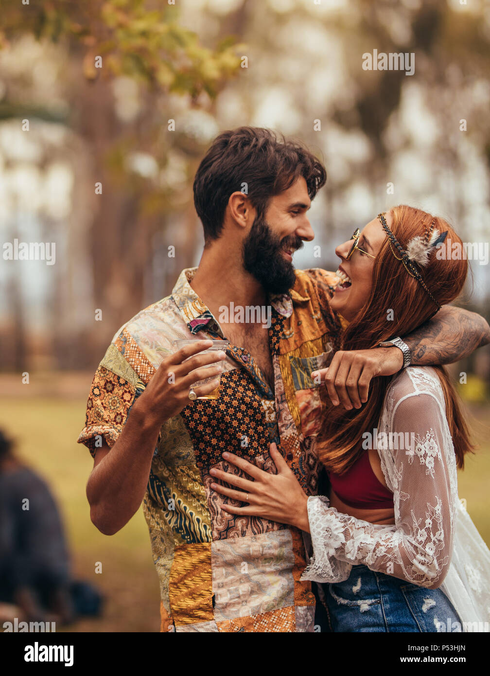 Young couple in love having a great time at music festival. Man and woman  dancing at music festival Stock Photo - Alamy
