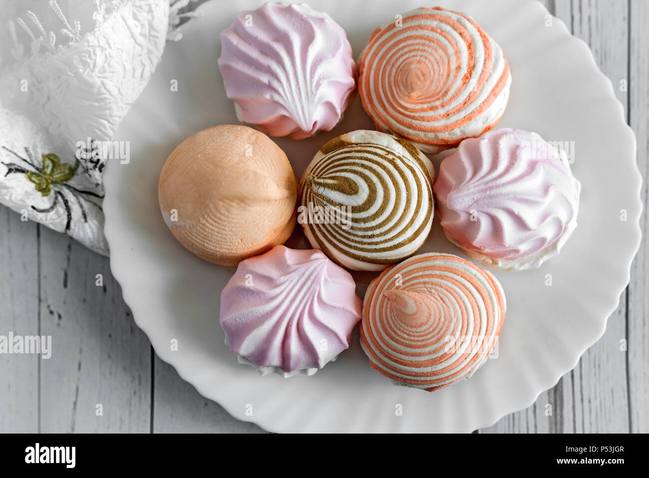 Marshmallows of different varieties on a plate. Stock Photo