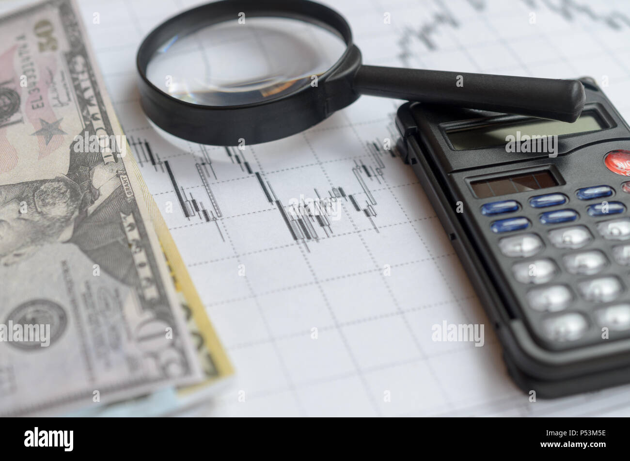 The concept of lending. Money, calculator magnifier Stock Photo Alamy