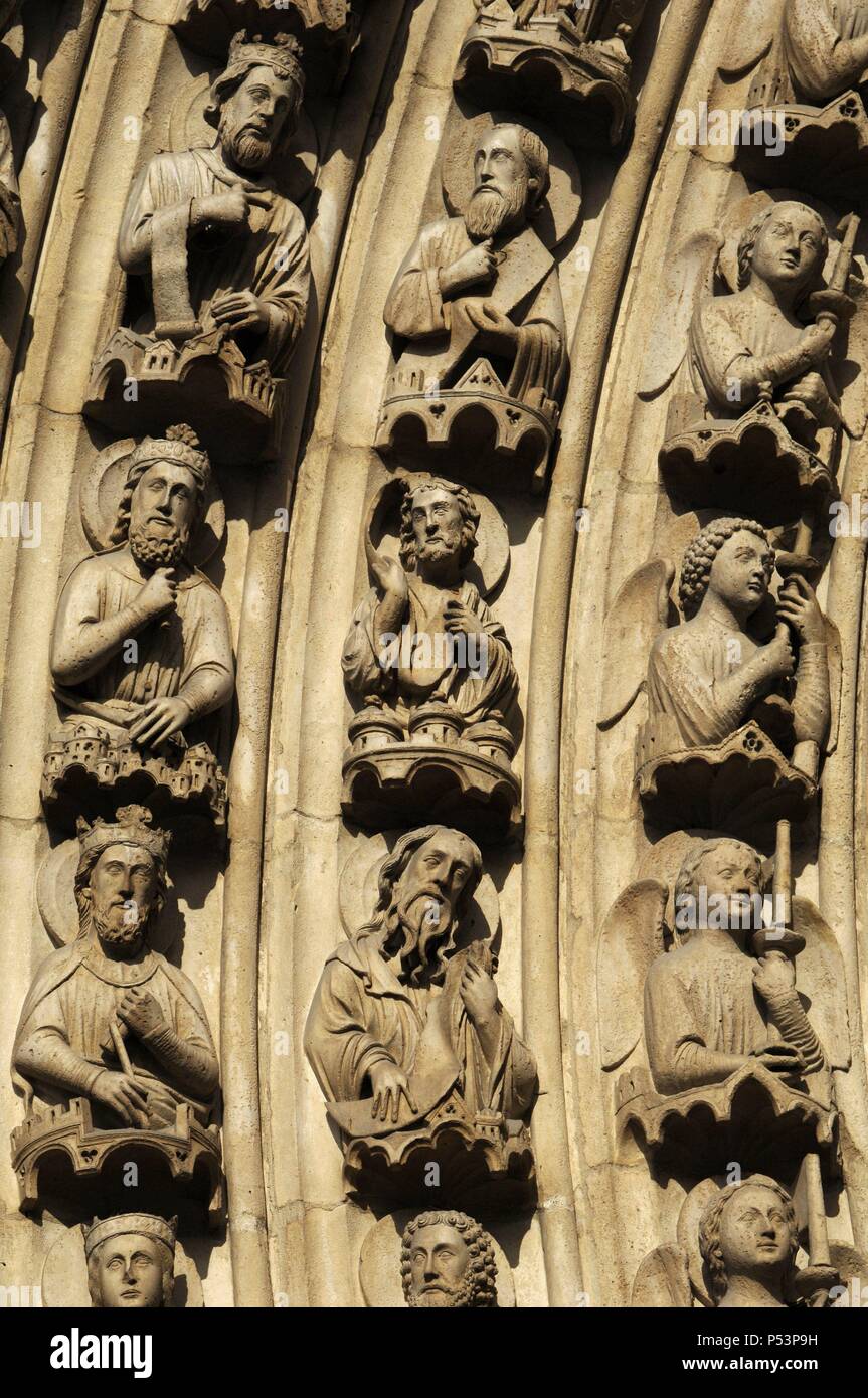 Gothic Art. France. Paris. Notre Dame. Portal of the Virgin (c. 1220). Left archivolt carved with the Heavenly Court (angels, patriarchs, kings, and prophets). Stock Photo