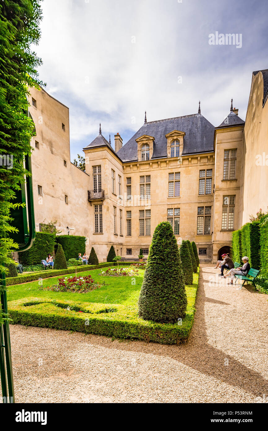 Jardin Lazare-Rachline is a small formal garden in the Marais district of Paris, France Stock Photo
