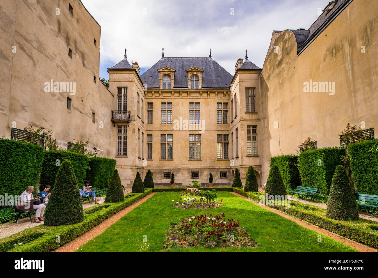 Jardin Lazare-Rachline is a small formal garden in the Marais district of Paris, France Stock Photo
