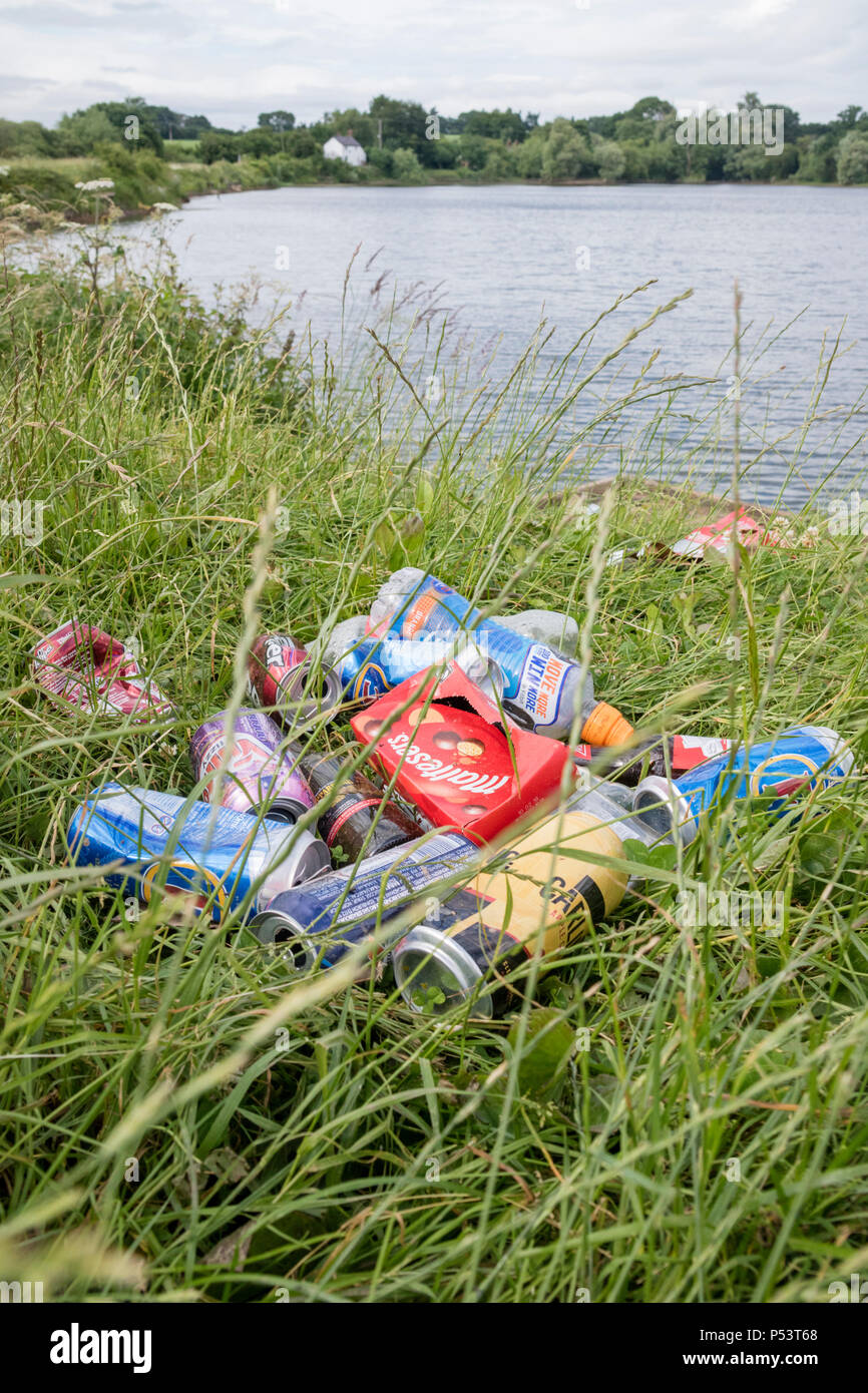 Litter left by a lake in the English countryside, England, UK Stock Photo Alamy