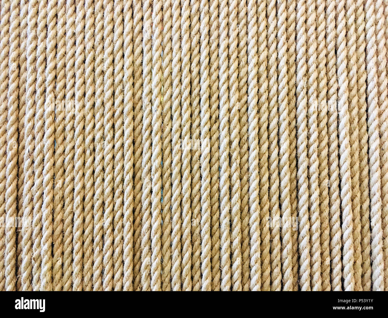 natural rope texture, beige twine, vertical arrangement Stock Photo - Alamy