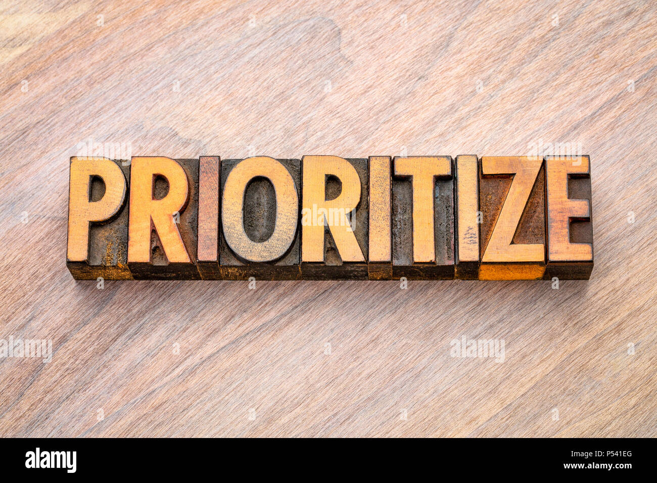 prioritize - word abstract in vintage letterpress wood type printing blocks Stock Photo