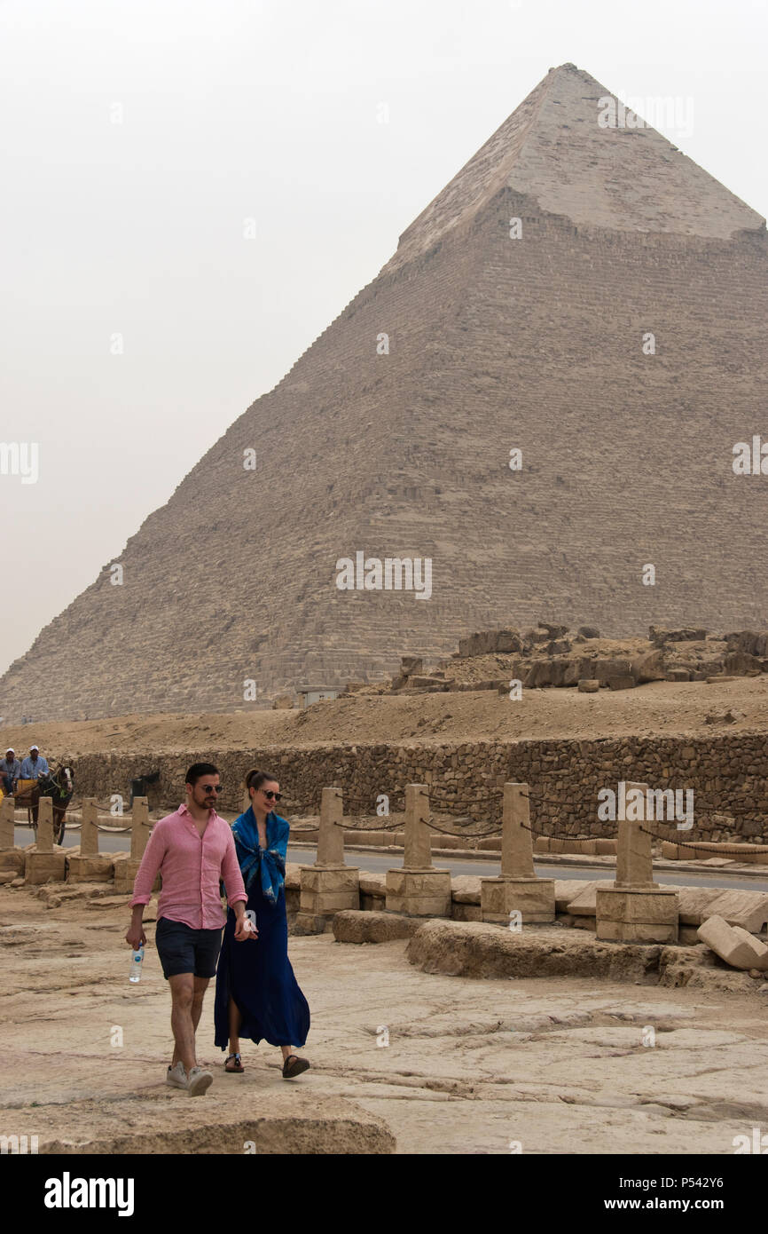 Tourists visit the Pyramid of Khafre (Chephren), the second-tallest of the Egyptian Pyramids of Giza, and tomb of the pharaoh Khafre. Stock Photo