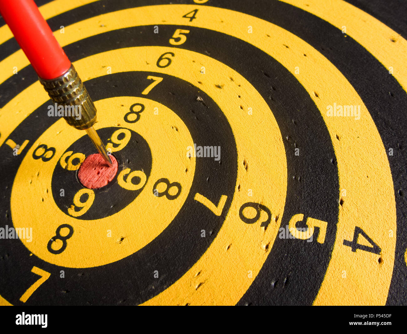 diagonal view of an used dartboard Stock Photo Alamy
