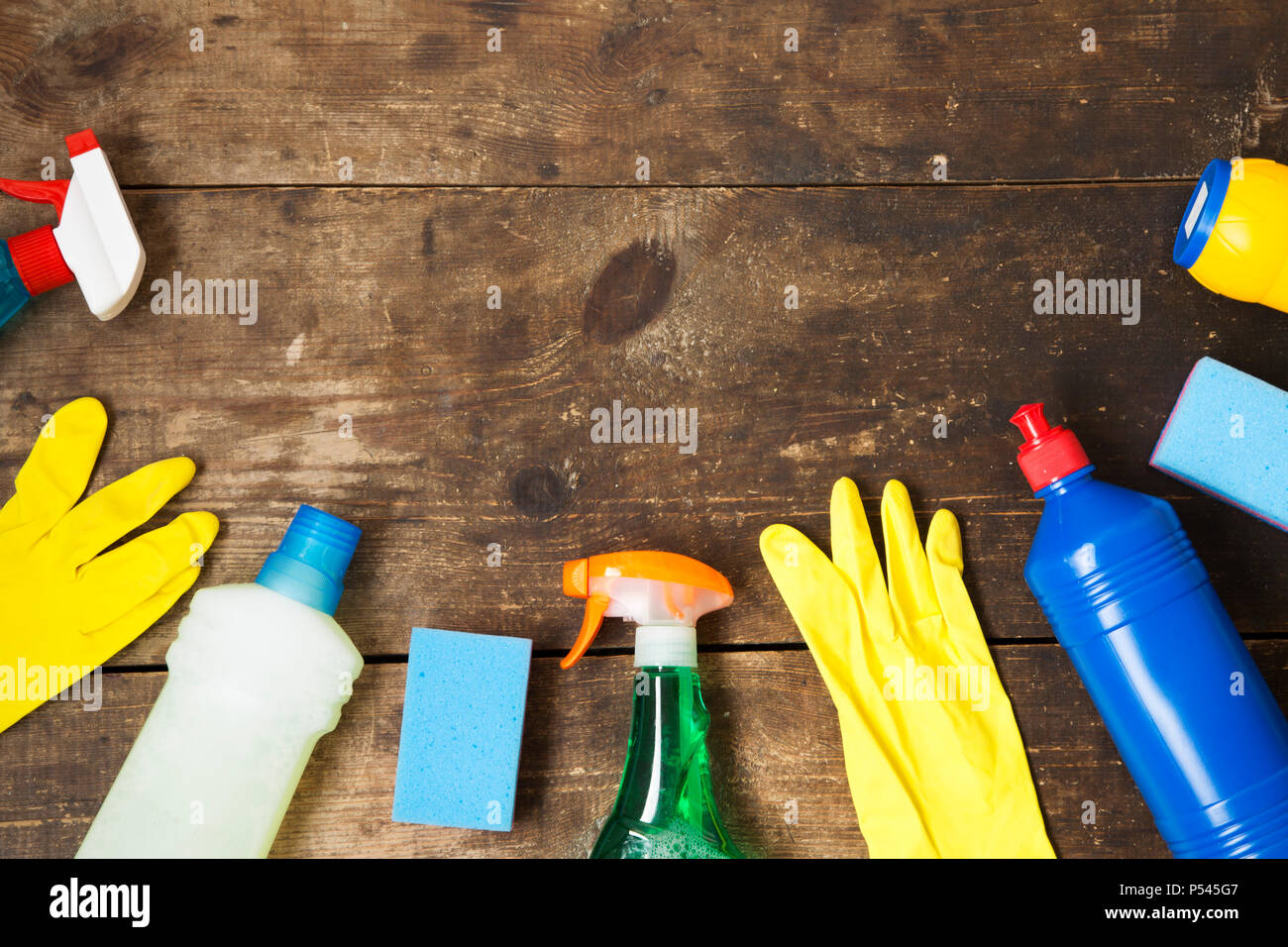 https://c8.alamy.com/comp/P545G7/house-cleaning-products-variety-on-wooden-background-top-view-from-above-flat-lay-copy-space-P545G7.jpg