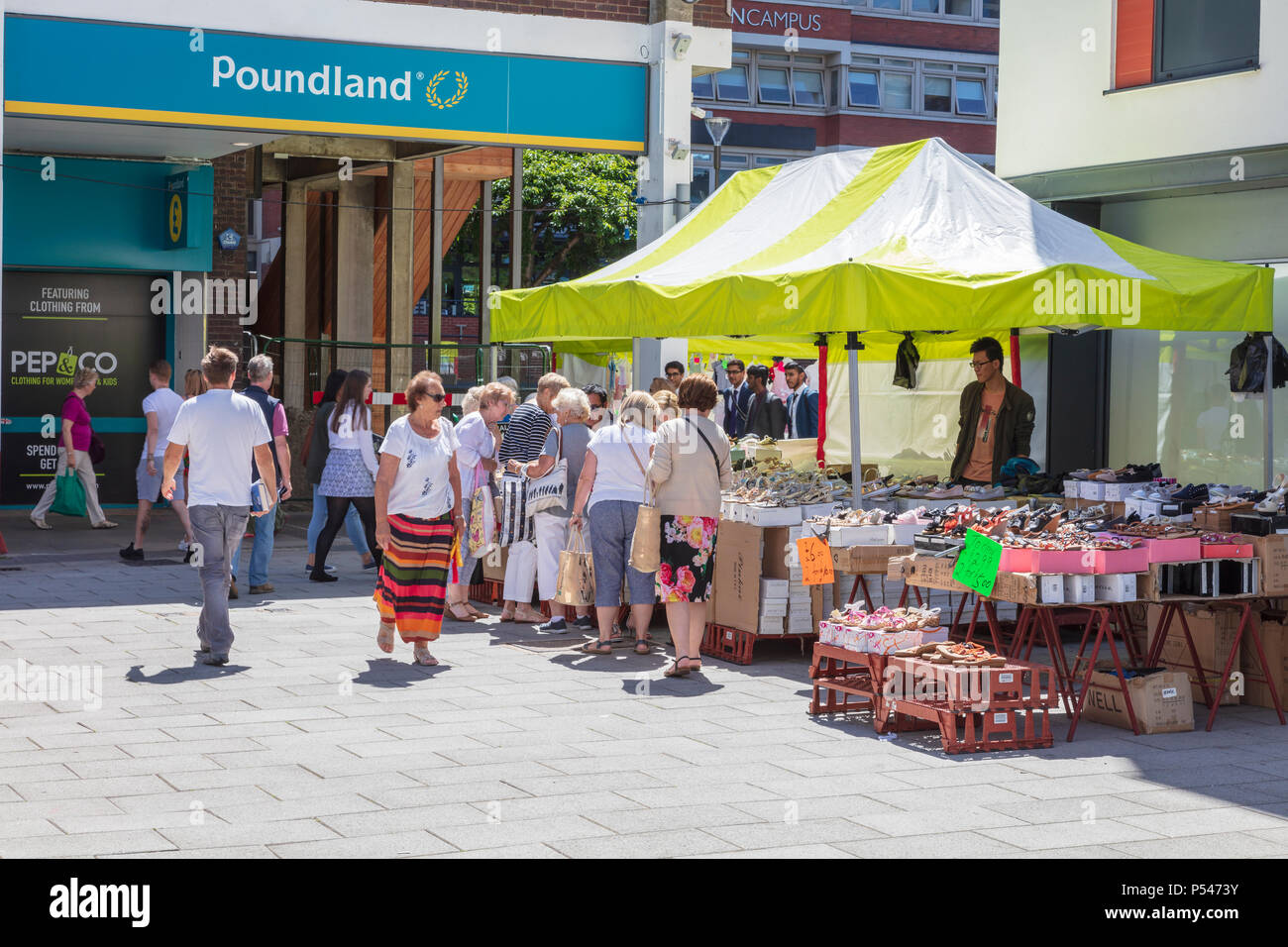 The very busy market in Orpingtons Walnut Shopping Centre, shoppers