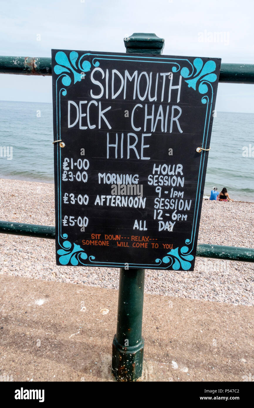 Sign showing the cost of deck chair hire in Sidmouth, Devon, 2018. Stock Photo