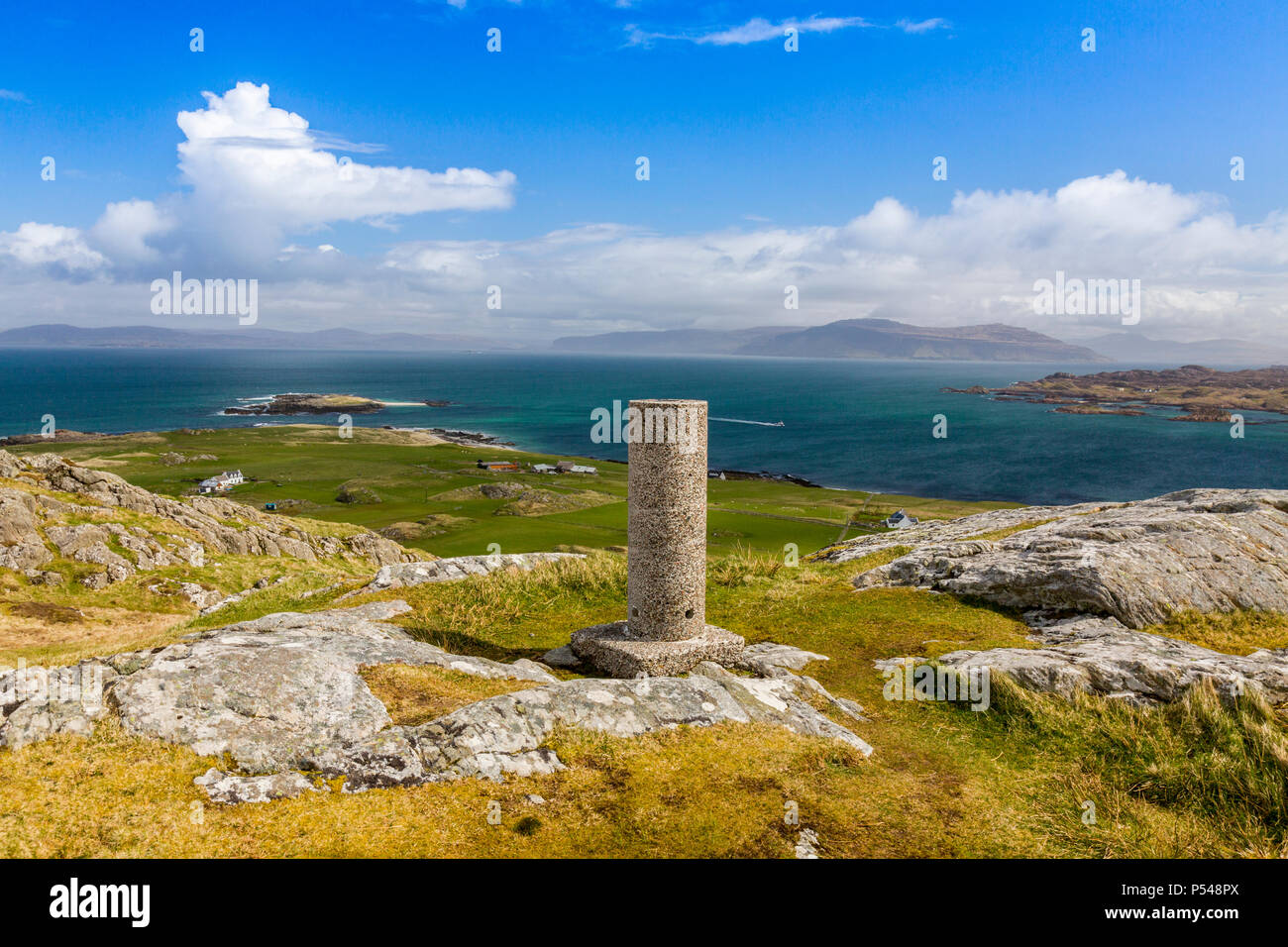 Looking NE at the hills of Mull from the trig point of Dun I (101m) the ...