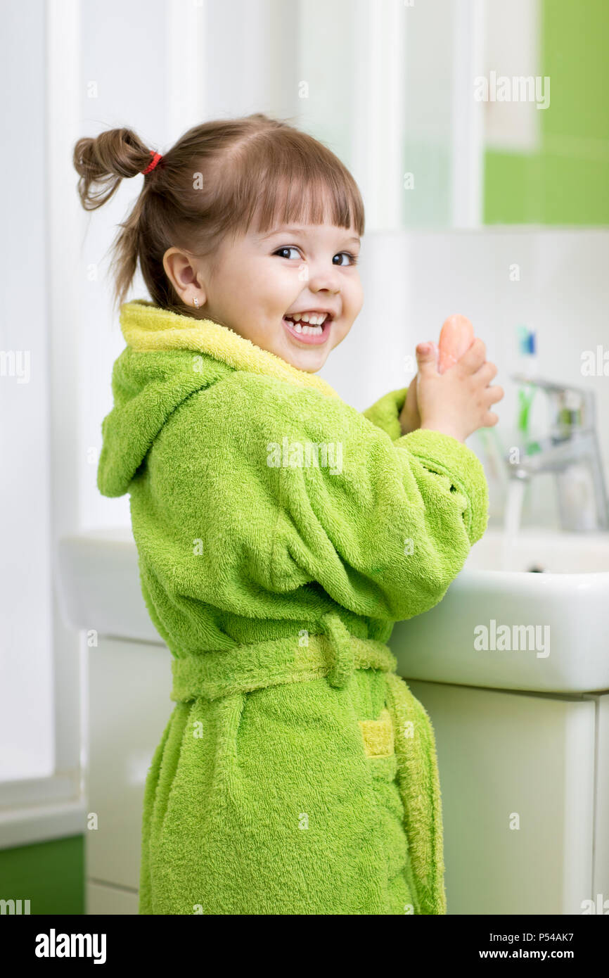 Child girl washing her hands Stock Photo - Alamy