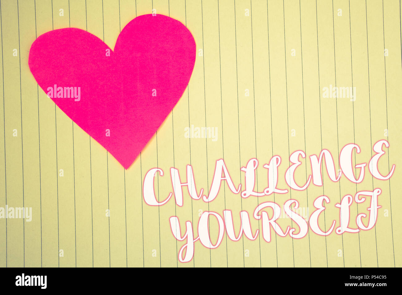 Word writing text Challenge Yourself. Business concept for Overcome Confidence Strong Encouragement Improvement Dare Light pink heart symbol white pap Stock Photo