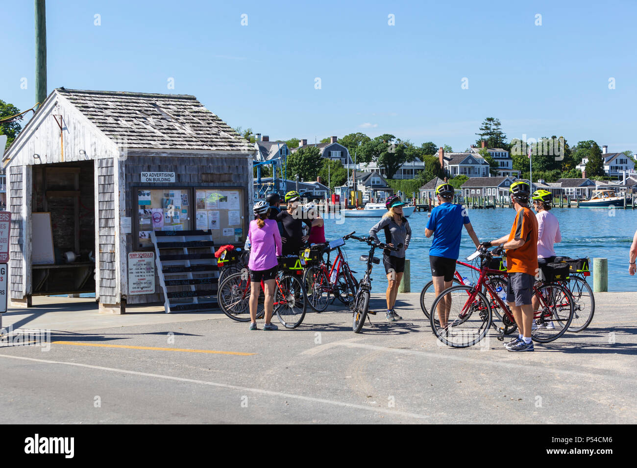 Cyclists wait on Chappaquiddick Island to take the Chappy Ferry across
