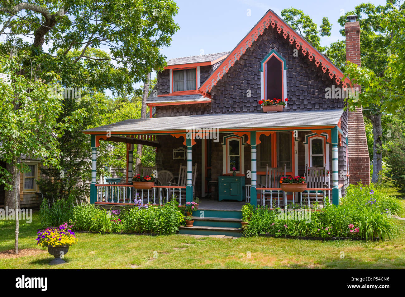 A colorful gingerbread cottage in the Martha's Vineyard Camp Meeting Association (MVCMA) in Oak Bluffs, Massachusetts. Stock Photo