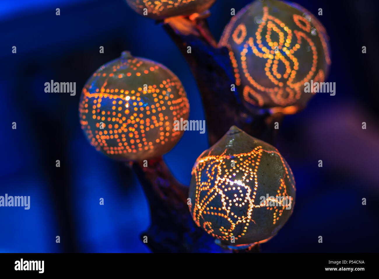 Beautiful handmade lantern lamp made from Strychnos nux-blanda A.W. Hill, fruits. Product of Thailand. Stock Photo