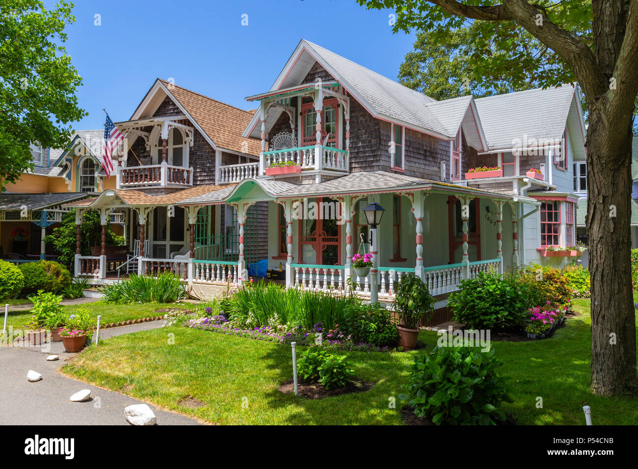 Colorful gingerbread cottages in the Martha's Vineyard Camp Meeting Association (MVCMA) in Oak Bluffs, Massachusetts. Stock Photo