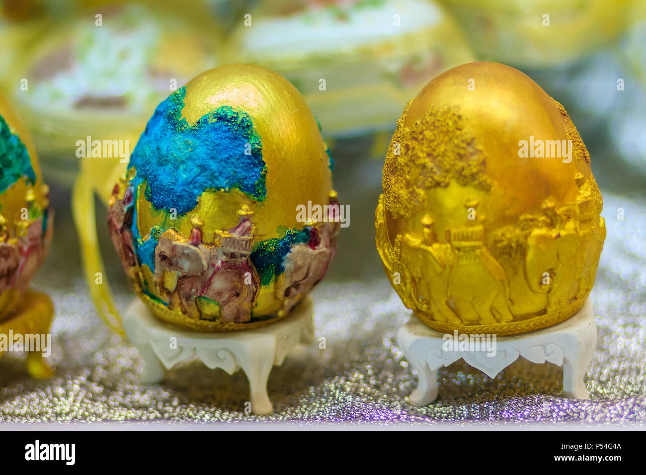 Beautiful Ester egg with Thai pattern. Handwriting inscription Happy Easter in Thai Style patterns. Stock Photo