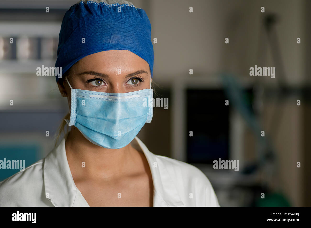 Blonde young nurse doctor in ICU ER OR room Stock Photo