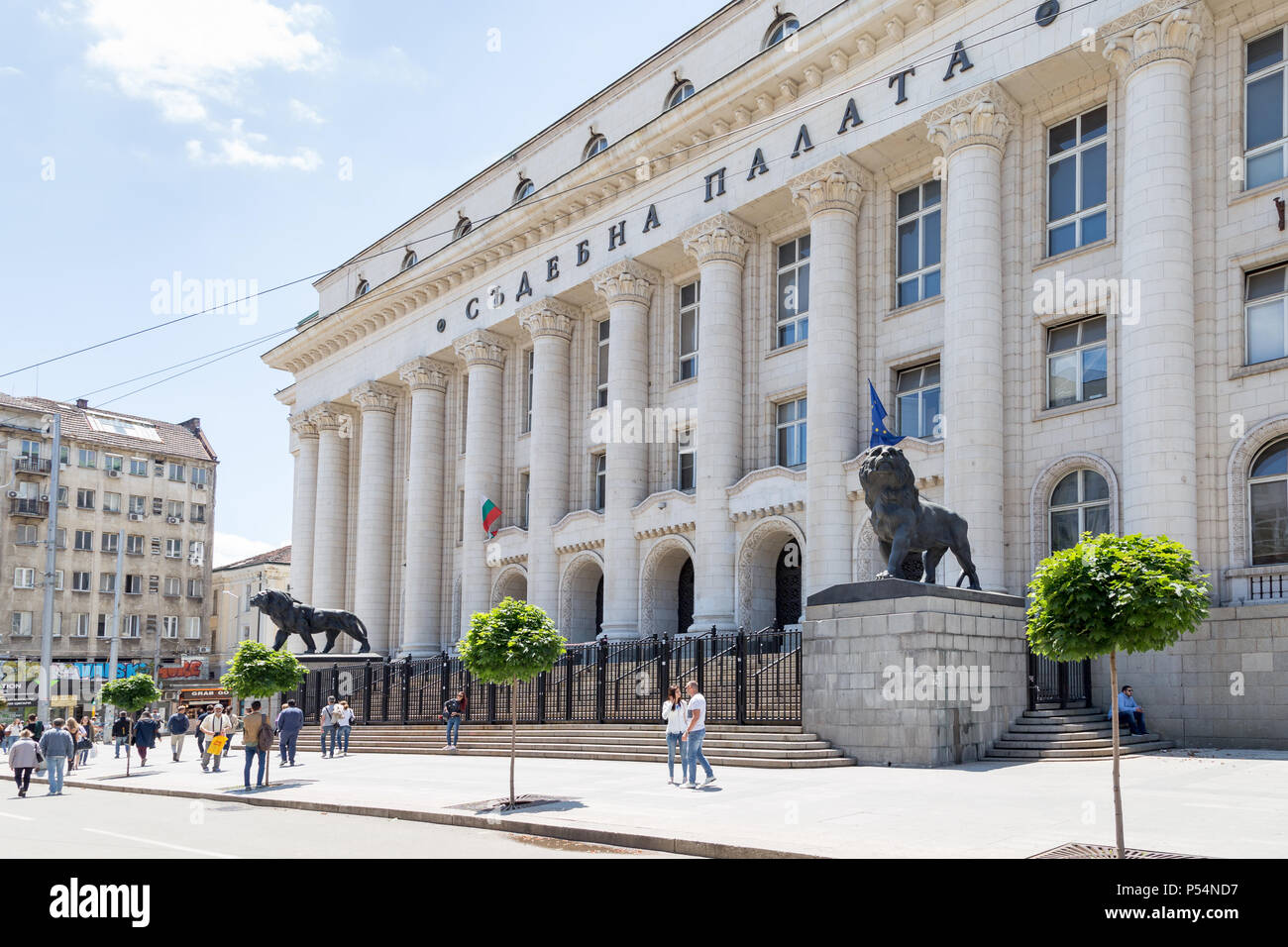 SOFIA, BULGARIA - JUNE 23: People enjoy the sunny weather in front of Sofia Court House in Sofia, Bulgaria on June 23, 2018. Stock Photo