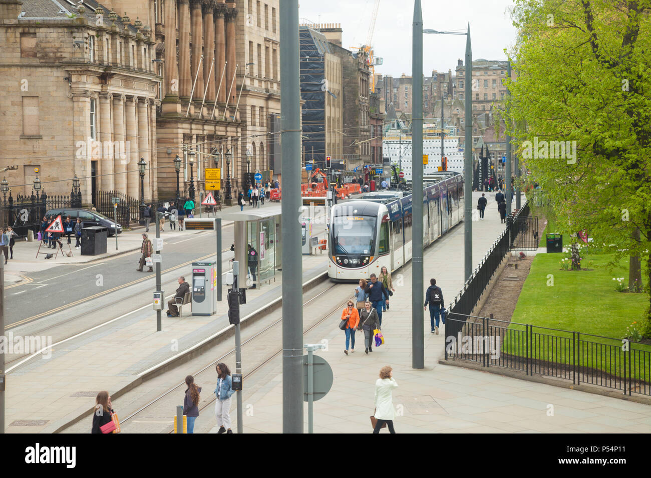 A tram in St Andrew Square Edinburgh Scotland. Stock Photo