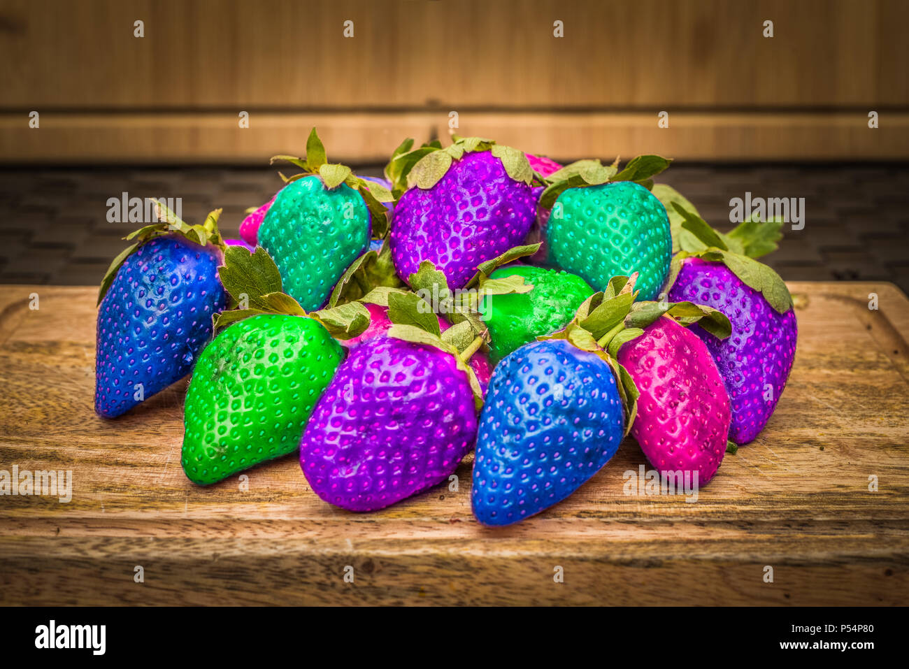 Rainbow coloured strawberries Stock Photo Alamy