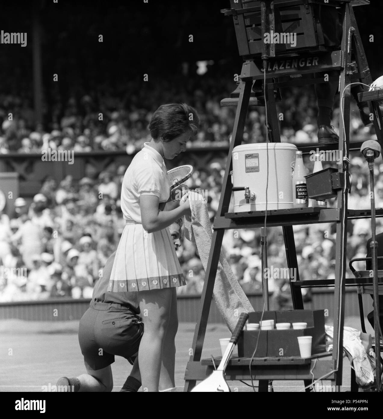 Wimbledon Tennis, Ladies day. Pictured, Billie Jean Moffitt (later King) in play against Margaret Smith. 26th June 1962. Stock Photo