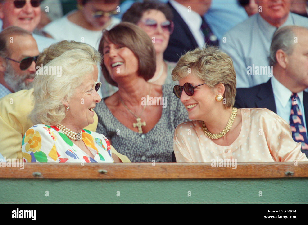 HRH The Princess of Wales, Princess Diana, attends the 1993 Men's Singles Wimbledon Tennis Final. She wears or attends to her sunglasses for most of the pictures on this sunny day as it was. The Princess is shown sitting next to her mother Frances Shand Kydd. Regarding the match, Pete Sampras defeated Jim Courier 7¿(7¿), 7¿(8¿), 3¿, 6¿in the final to win the Gentlemen's Singles title at the 1993 Wimbledon Championships. This was the first of Pete's Open Era record of seven Wimbledon titles.  Picture taken 4th July 1993 Stock Photo