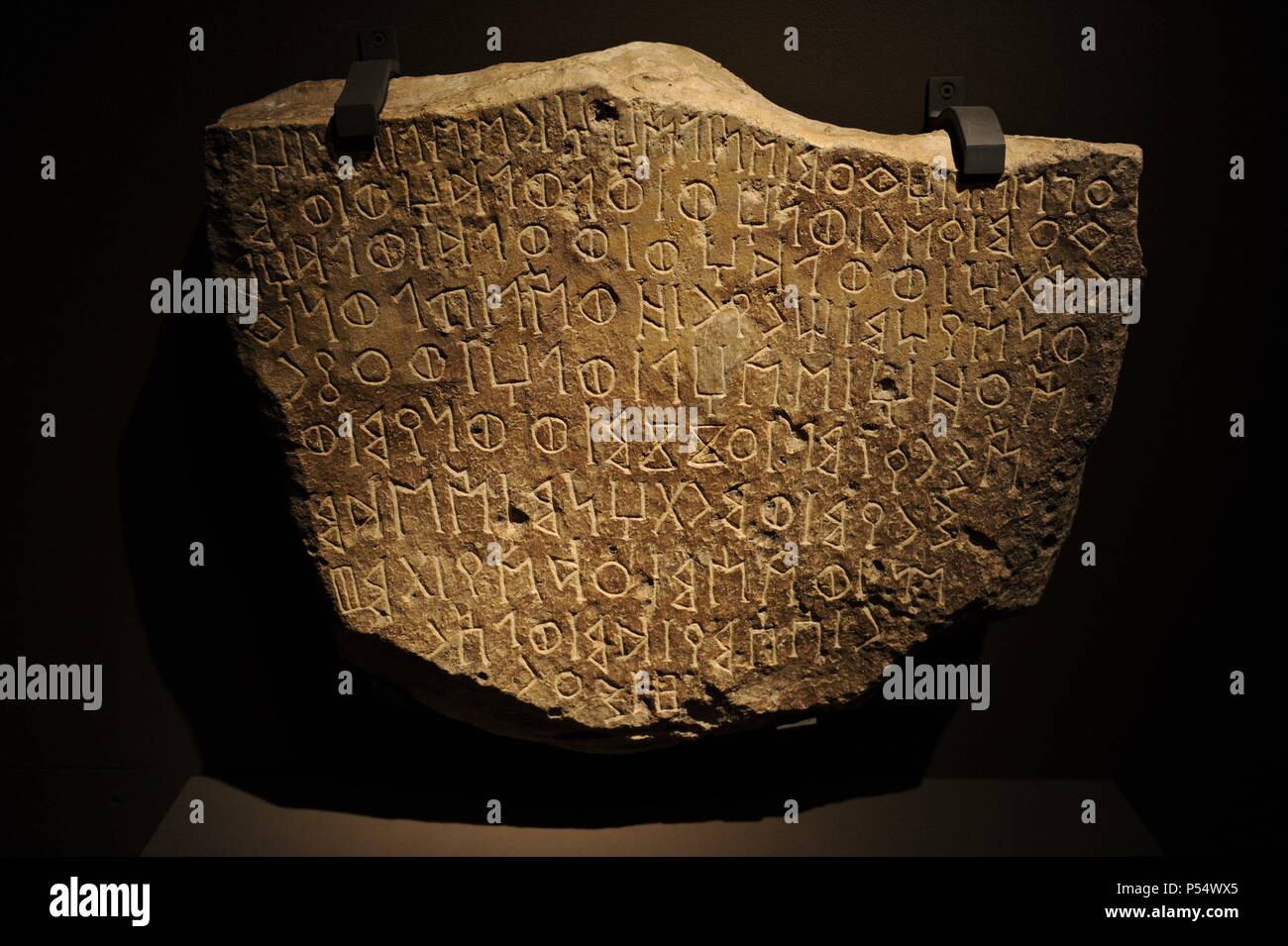 Pre-Islam. Funerary stele with an Old South Arabian inscription. Late 1st millennium BC. Limestone. 60x48x13 cm. Qaryat al-Faw. National Museum. Riyadh. Saudi Arabia. Stock Photo