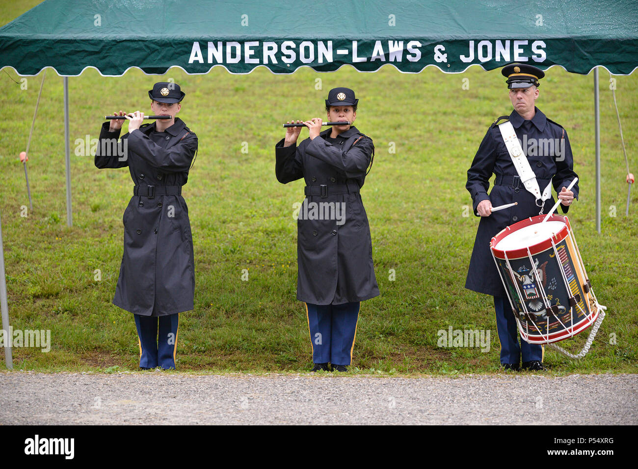 Army Staff Sgt. Erin Fleming (Left), Staff Sgt. Joie Byrd and Staff Sgt. Brian Barnhardt from the Old Guard Fife and Drum Corps, 3rd United States Infantry Regiment at Fort Myer, Va., play the fife and drum May 12, 2017 during the reinterment of Private Samuel Howard, Revolutionary War soldier, at Resthaven Cemetery in Baxter, Ky. (USACE Stock Photo