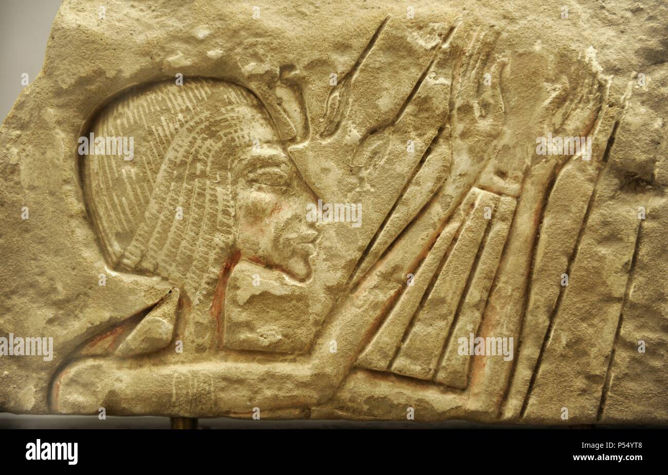 Relief of a pharaoh Akhenaten or Nefertiti. Sandstone. Probably from Karnak, Egypt. Amarna Period. Ny Carlsberg Glyptotek. Copenhagen. Denmark. Stock Photo