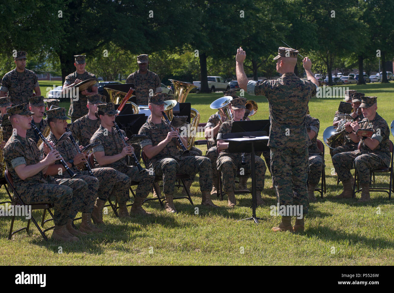 The U.S. Marine Corps Quantico Band, performs during the Centennial Celebration Ceremony at Lejeune Field, Marine Corps Base Quantico (MCBQ), Va., May 10, 2017. The event commemorates the founding of MCBQ in 1917, and consisted of performances by the U.S. Marine Corps Silent Drill Platoon and the U.S. Marine Drum & Bugle Corps. Stock Photo
