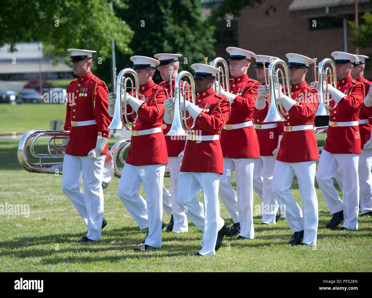 The U.S. Marine Drum and Bugle Corps marches during the Centennial Celebration Ceremony at