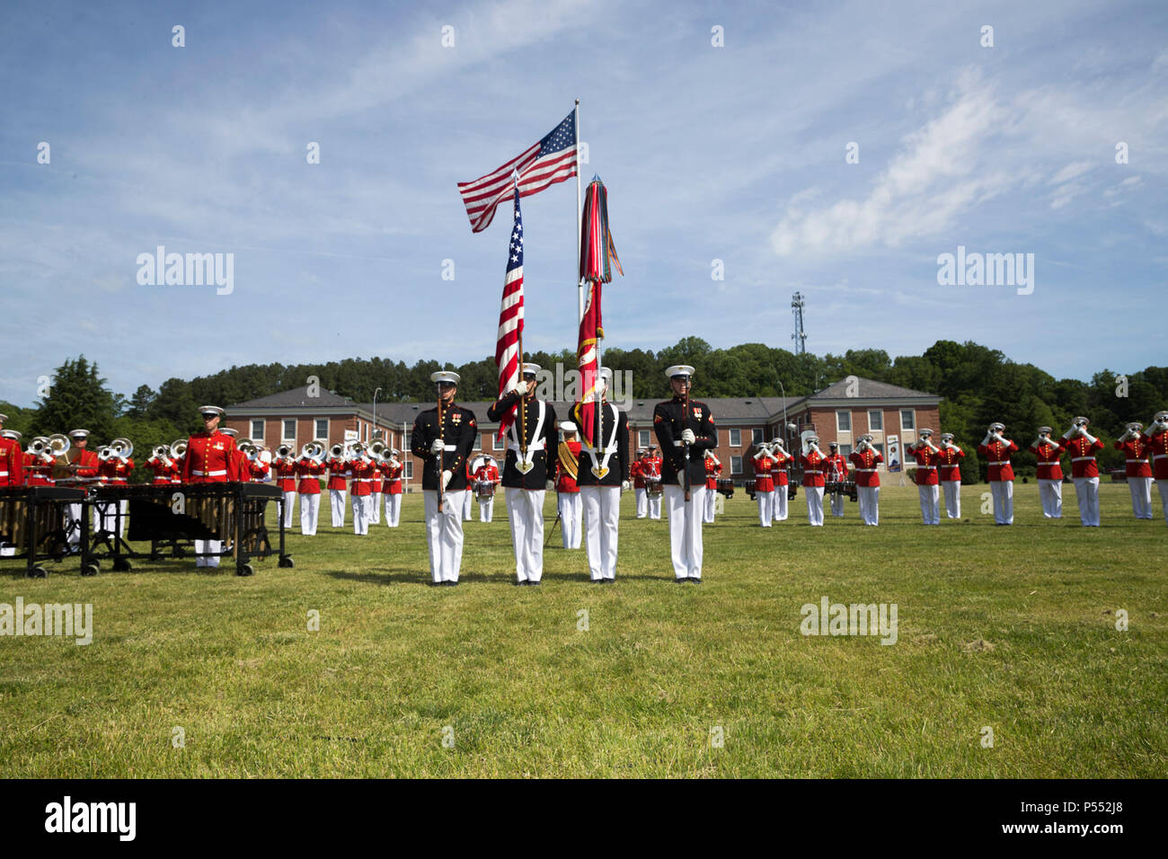 The U.S. Marine Corps Quantico Color Guard presents the colors during the Centennial Celebration Ceremony at Lejeune Field, Marine Corps Base (MCB) Quantico, Va., May 10, 2017. The event commemorates the founding of MCB Quantico in 1917, and consisted of performances by the U.S. Marine Corps Silent Drill Platoon and the U.S. Marine Drum & Bugle Corps. Stock Photo