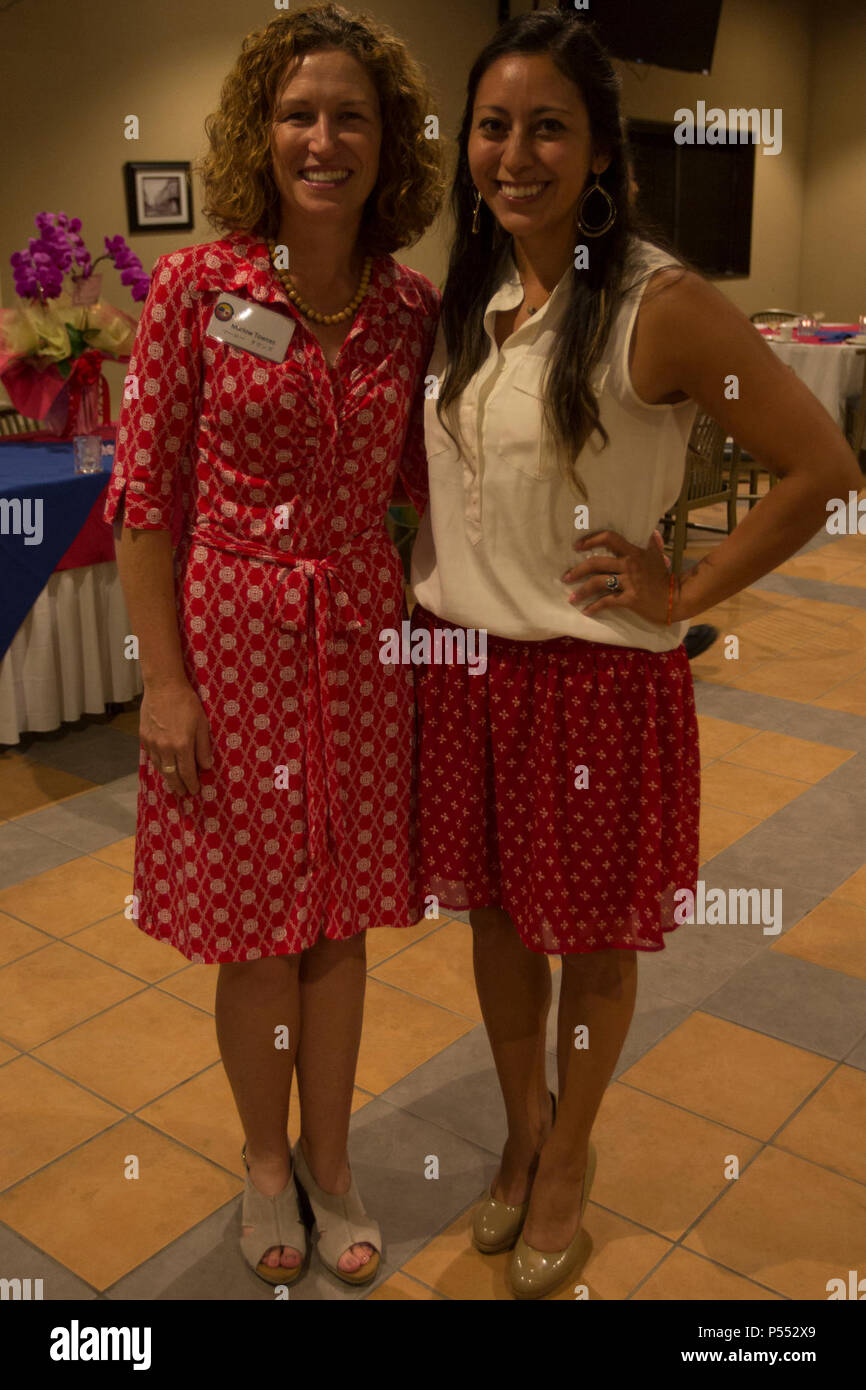 Marlow Townes, left, and Karen Flores pose for a photo during the American Women’s Welfare Association Annual Friendship Social May 10 on Torii Station, Okinawa, Japan. The AWWA is made up of five spouse clubs on Okinawa: the Kadena Officers’ Spouses’ Club, the Naval Officers’ Spouses’ Club on Okinawa, the Army Community Group of Okinawa, the Okinawa Enlisted Spouses’ Club, and the Marine Officers’ Spouses’ Club Okinawa. Townes is the AWWA president. For 45 years, AWWA has been fostering the relationship with the community of Okinawa through charitable donations, friendship and community invol Stock Photo