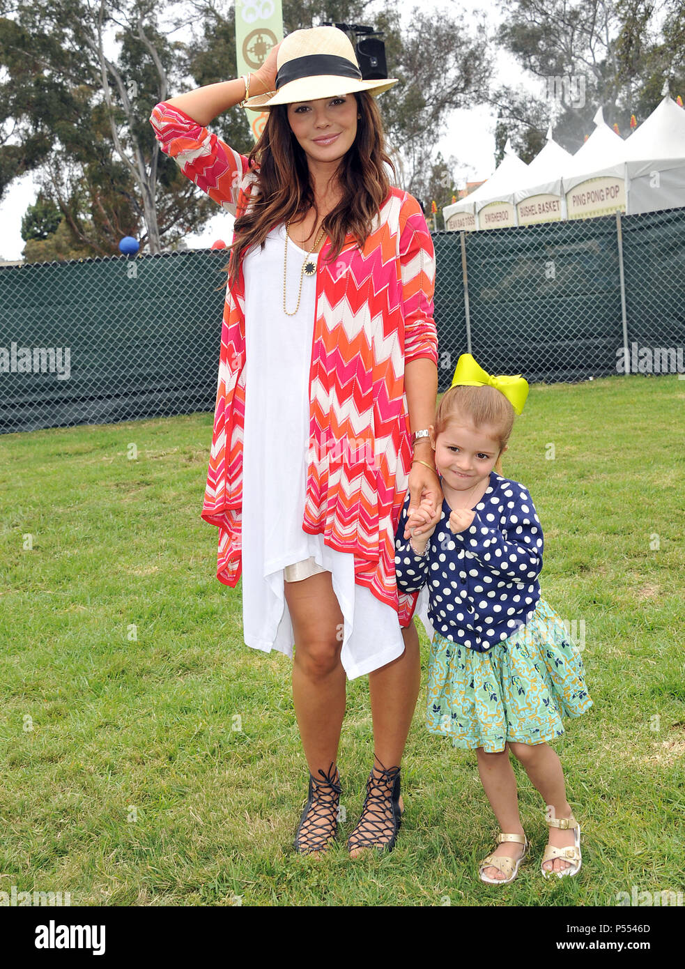 Ali Landry, daughter at the Pediatric Aid Foundation 2011 at the
