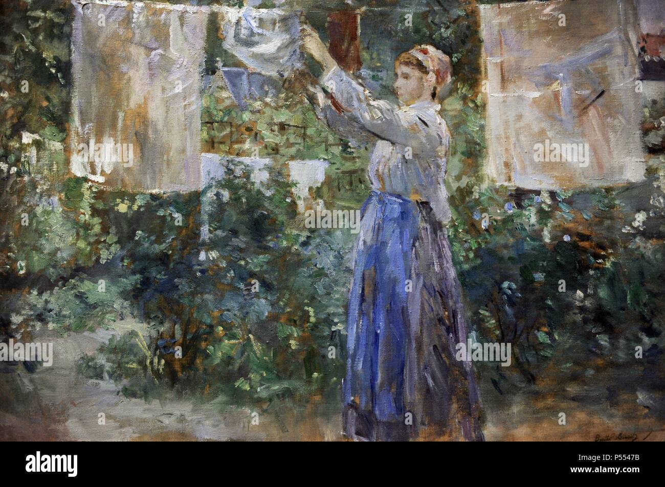 Berthe Morisot (1841-1895). French painter. Impressionism. Peasant girl hanging clothes to dry (1881). Ny Carlsberg Glyptotek. Copenhgen. Denmark. Stock Photo