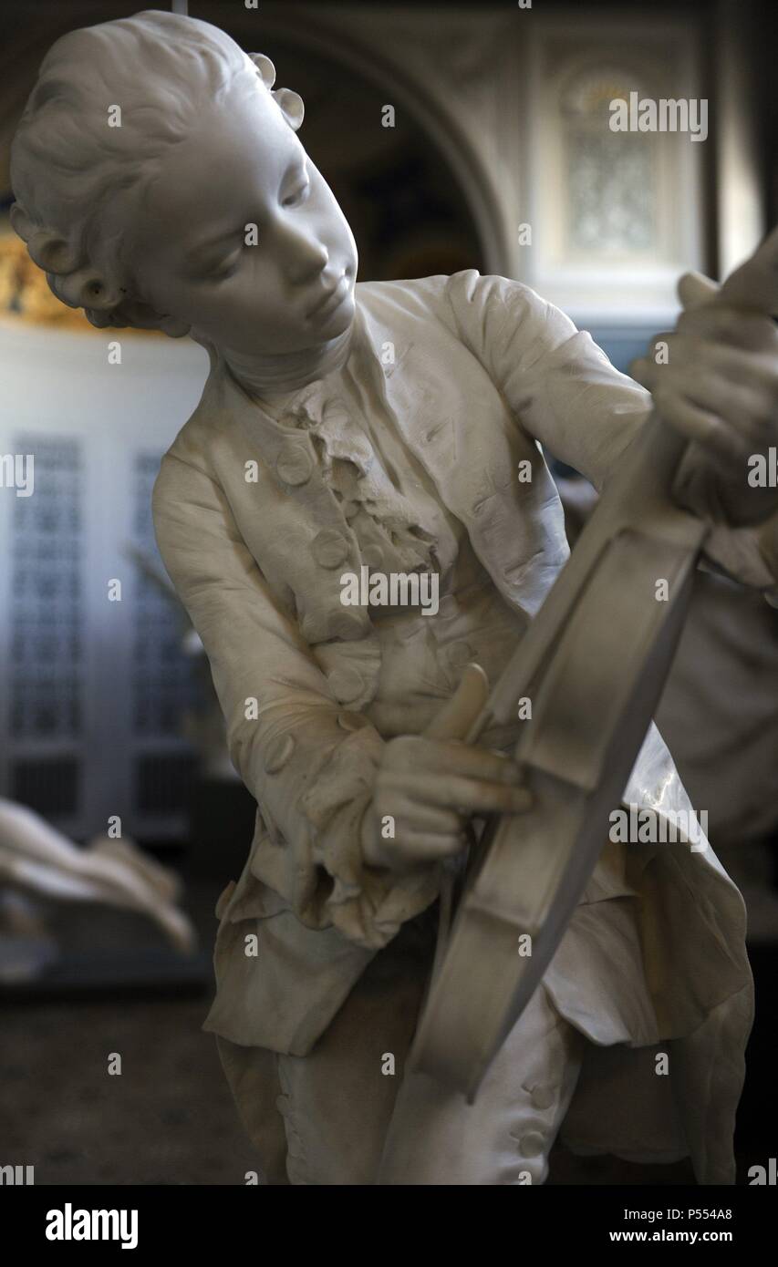 Wolfgang Amadeus Mozart (1756-1791). Austrian composer. Sculpture of Mozart  child playing the violin by Louis-Ernest Barrias (1841-1905). Carlsberg Glyptotek Museum. Copenhagen. Denmark. Stock Photo