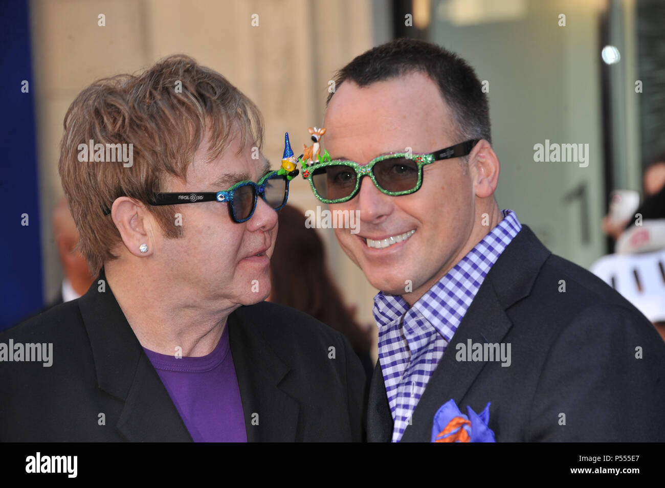 Elton Jones, David Furnish Gnomeo and Juliet Premiere at the El