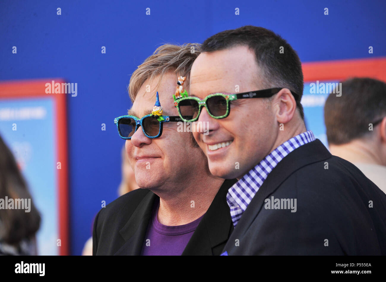 Elton Jones, David Furnish Gnomeo and Juliet Premiere at the El