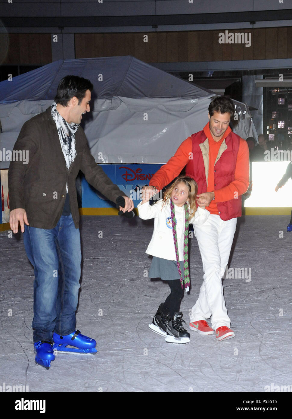 Gilles Marini, David Charvet, daughter  at Toy Story 3 On Ice To benefit the Children Hospital at the Nokia Ice Skating in Los Angeles.Gilles Marini, David Charvet, daughter  ------------- Red Carpet Event, Vertical, USA, Film Industry, Celebrities,  Photography, Bestof, Arts Culture and Entertainment, Topix Celebrities fashion /  Vertical, Best of, Event in Hollywood Life - California,  Red Carpet and backstage, USA, Film Industry, Celebrities,  movie celebrities, TV celebrities, Music celebrities, Photography, Bestof, Arts Culture and Entertainment,  Topix, vertical,  family from from the ye Stock Photo